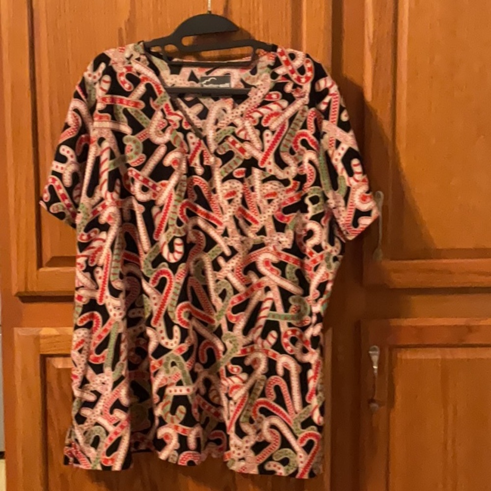 Gently used Christmas candy, cane, print scrub, top women’s size XL